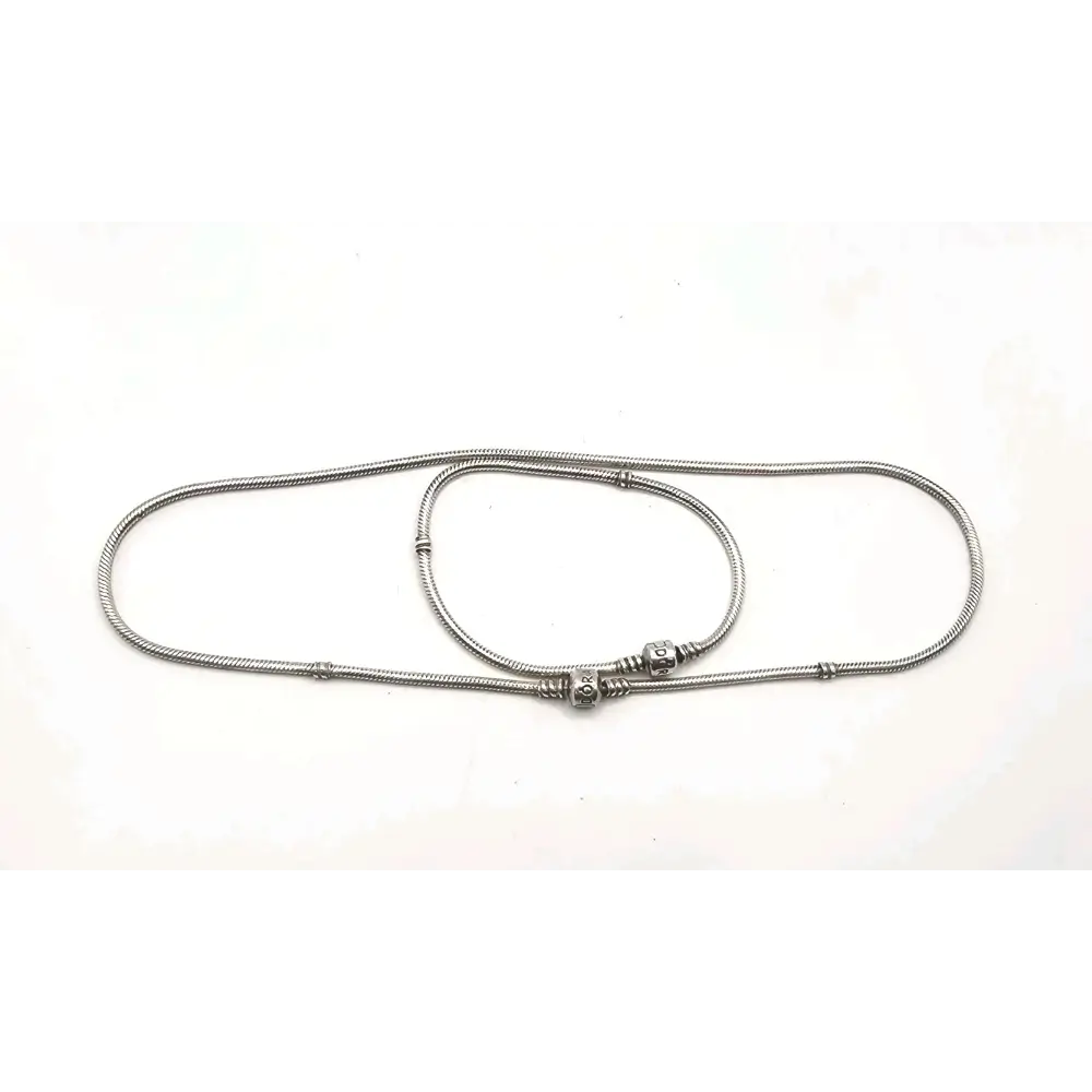 Metallic bracelet and Necklace on a white background