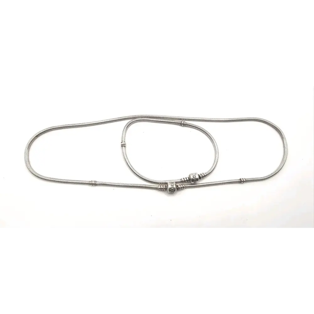 Silver bracelet and Necklace on a white background