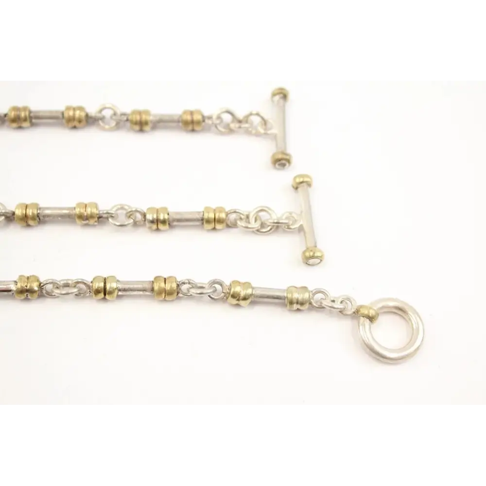 Close-up of a gold and silver chain