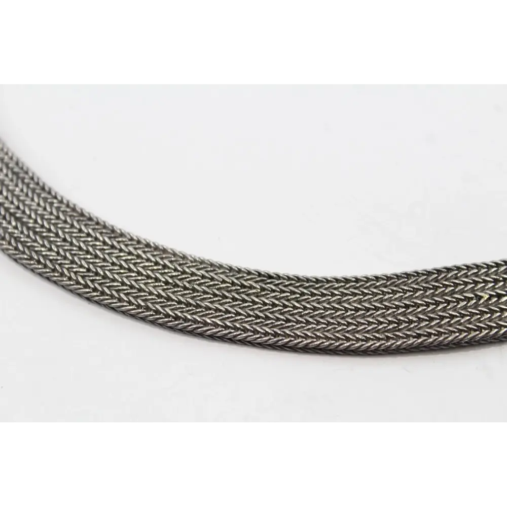 Close-up of a braided black and gray cord