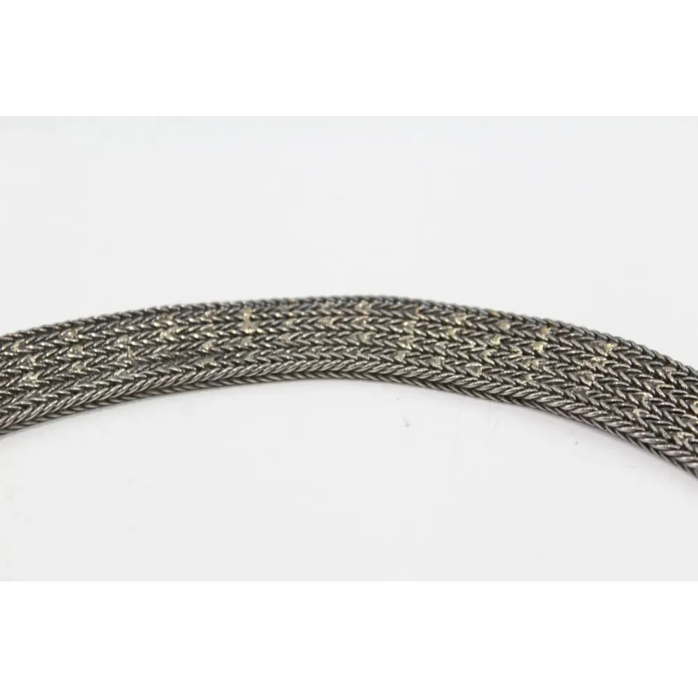 Close-up of a braided rope on a white background