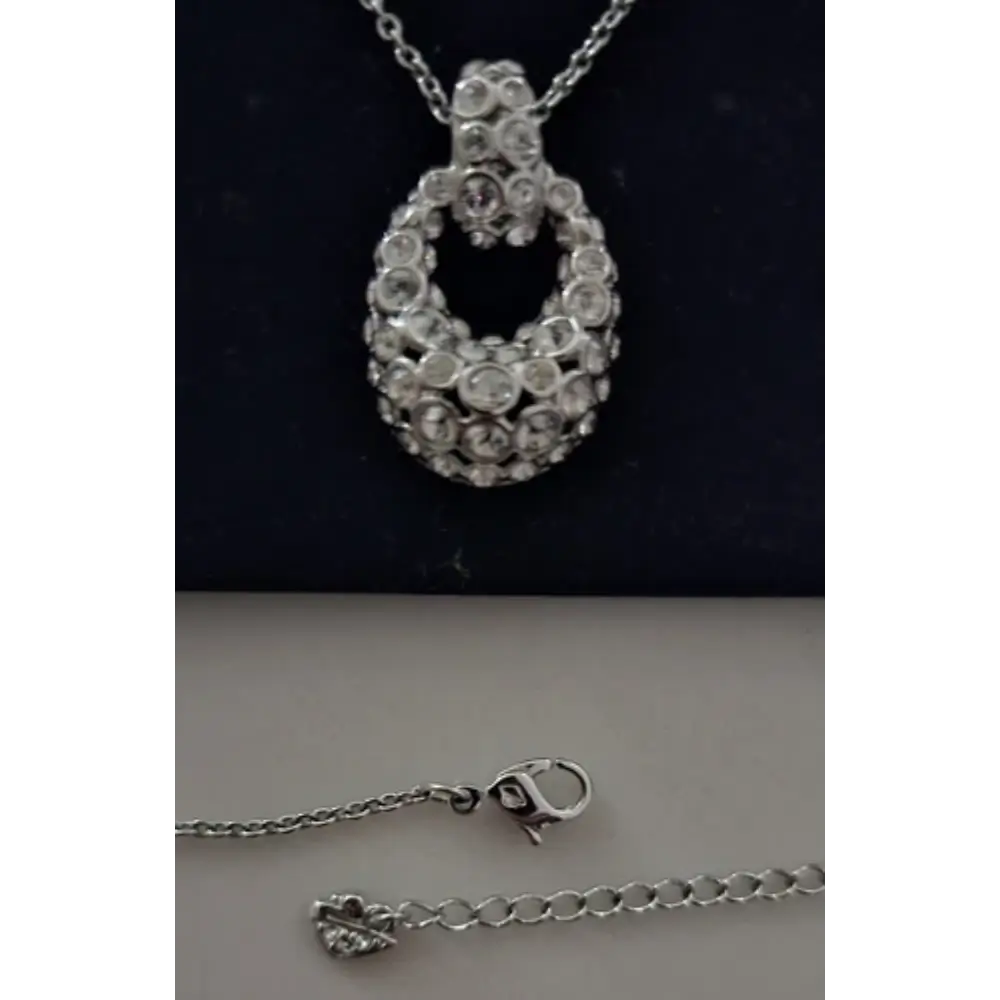 Silver necklace with a detailed pendant