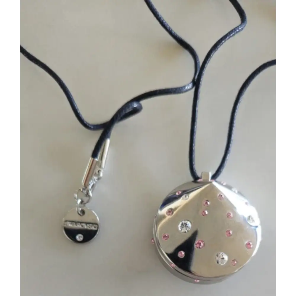 Necklace with a heart-shaped pendant featuring crystals