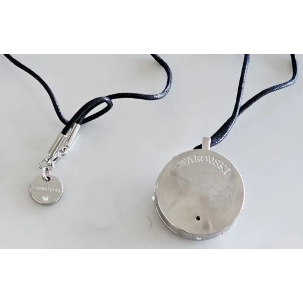 Silver necklace with a round pendant