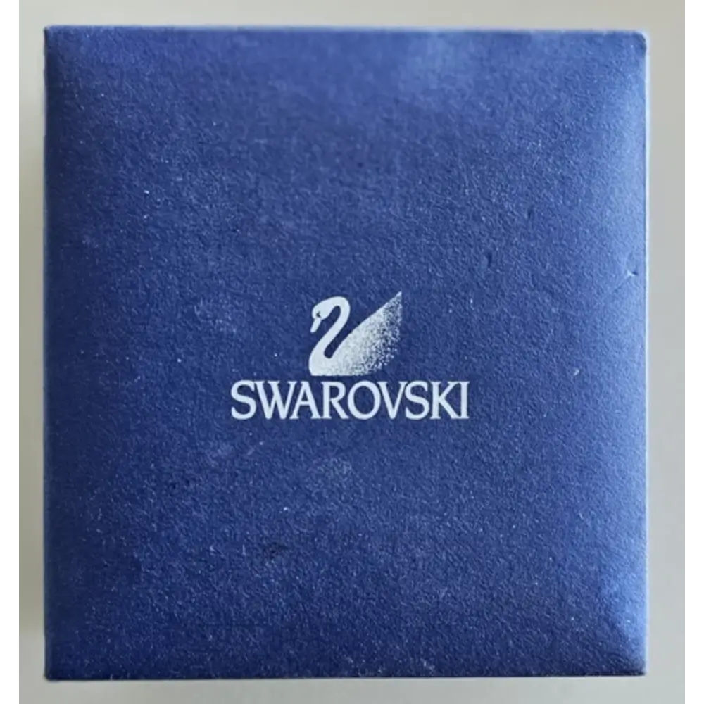 Swarovski branded blue box on a light gray background