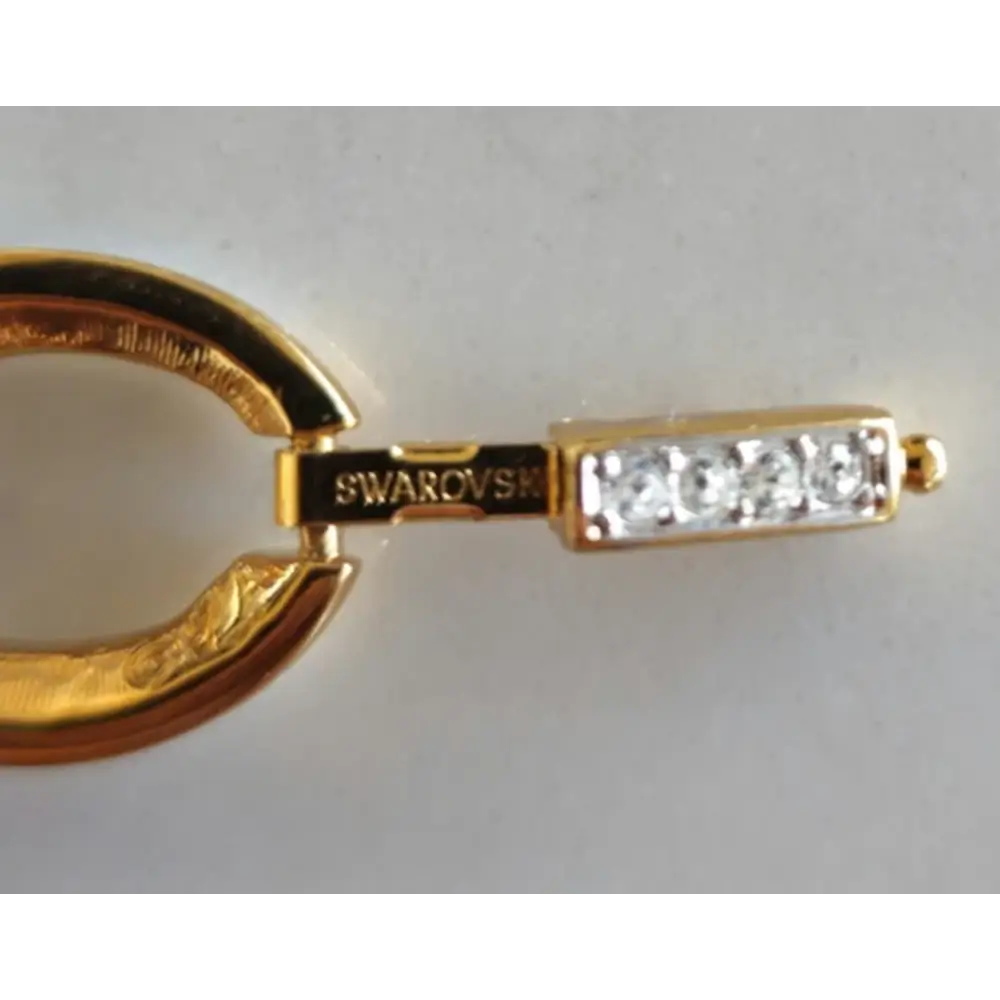 Gold earring with Swarovski crystals