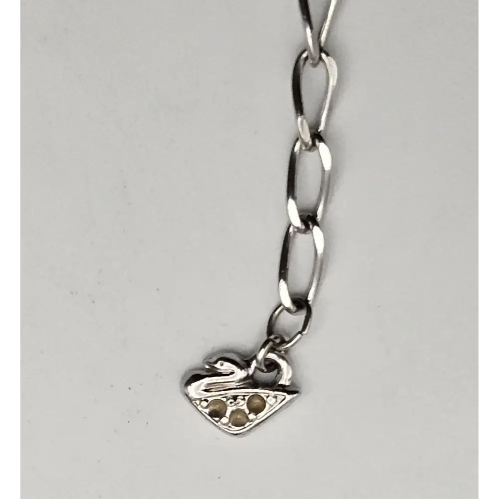 Silver chain with a heart-shaped pendant