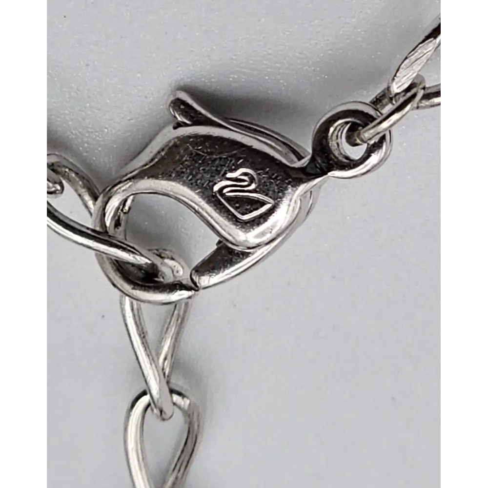 Close-up of a silver bracelet clasp