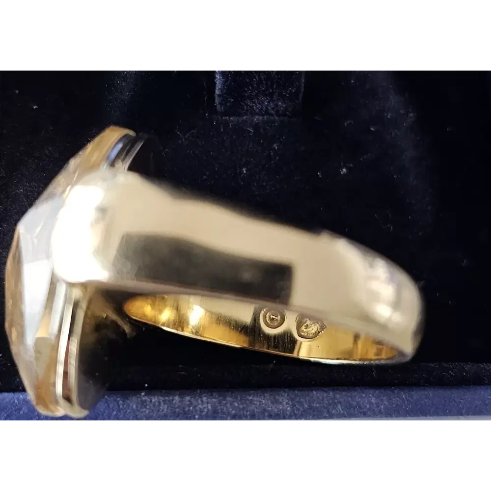 Gold ring with a large gemstone