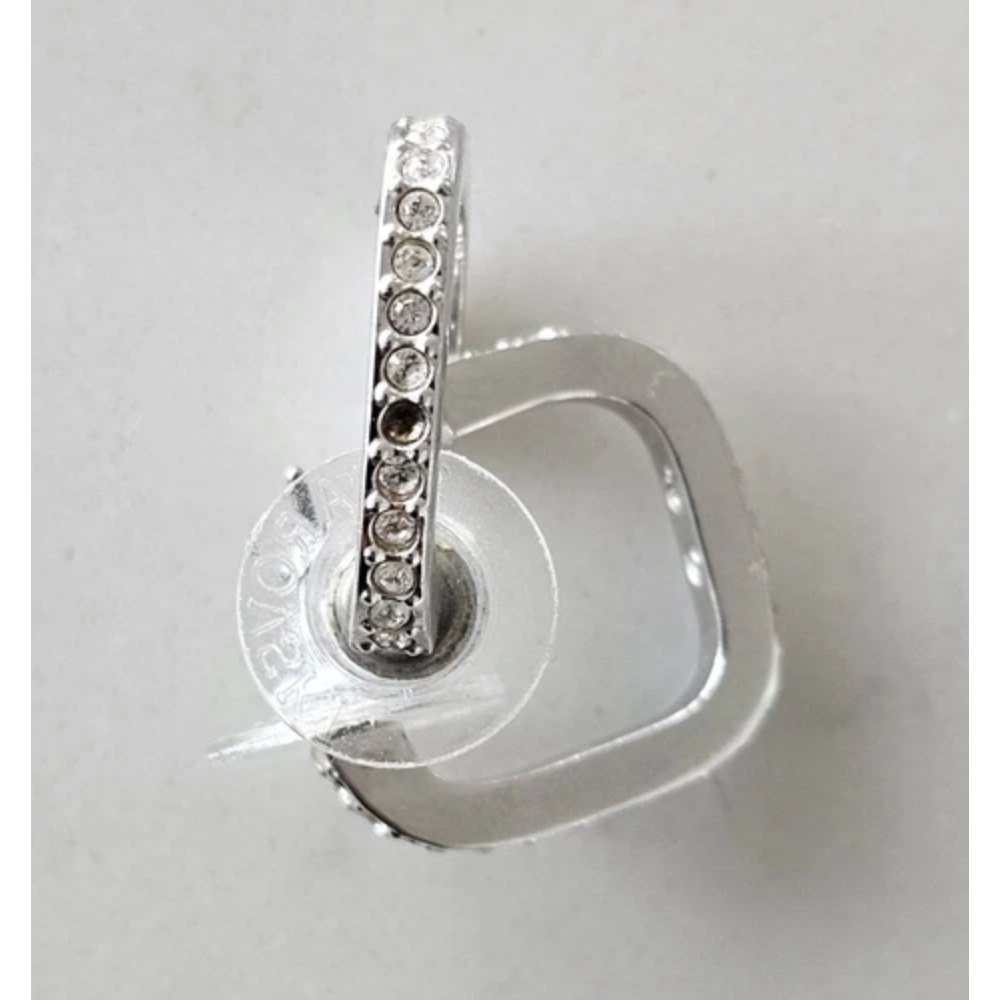 Silver earring with clear gemstones