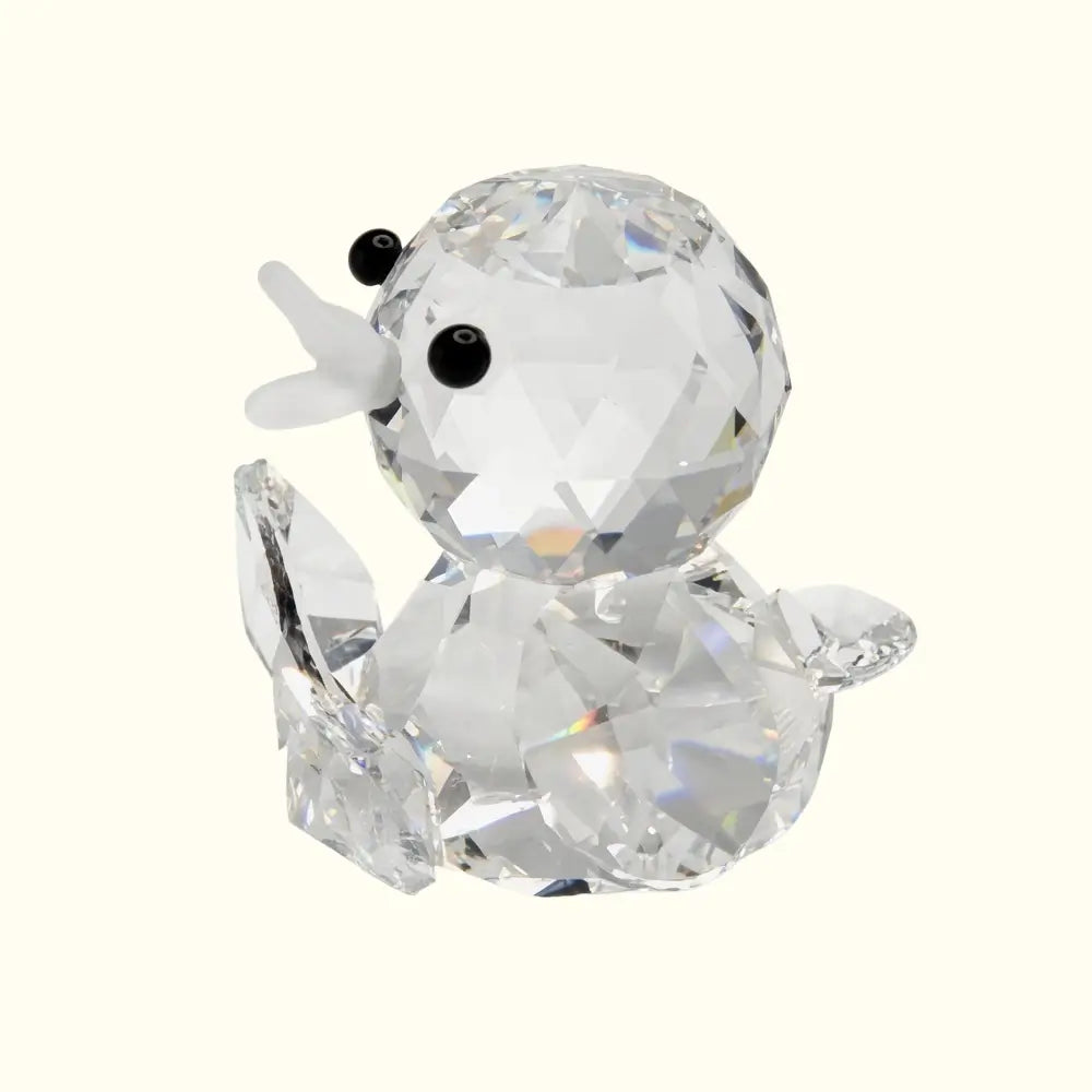 Crystal figurine of a dog on a white background