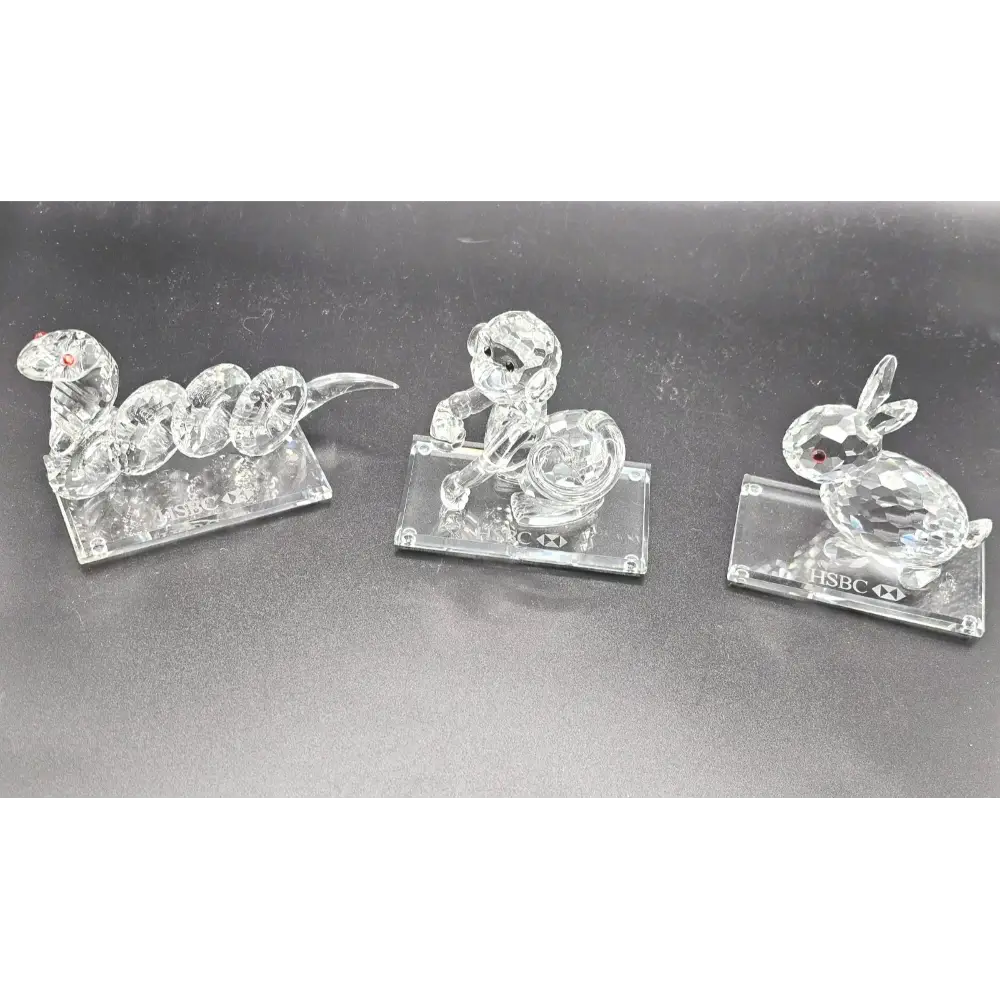 Three clear crystal animal figurines