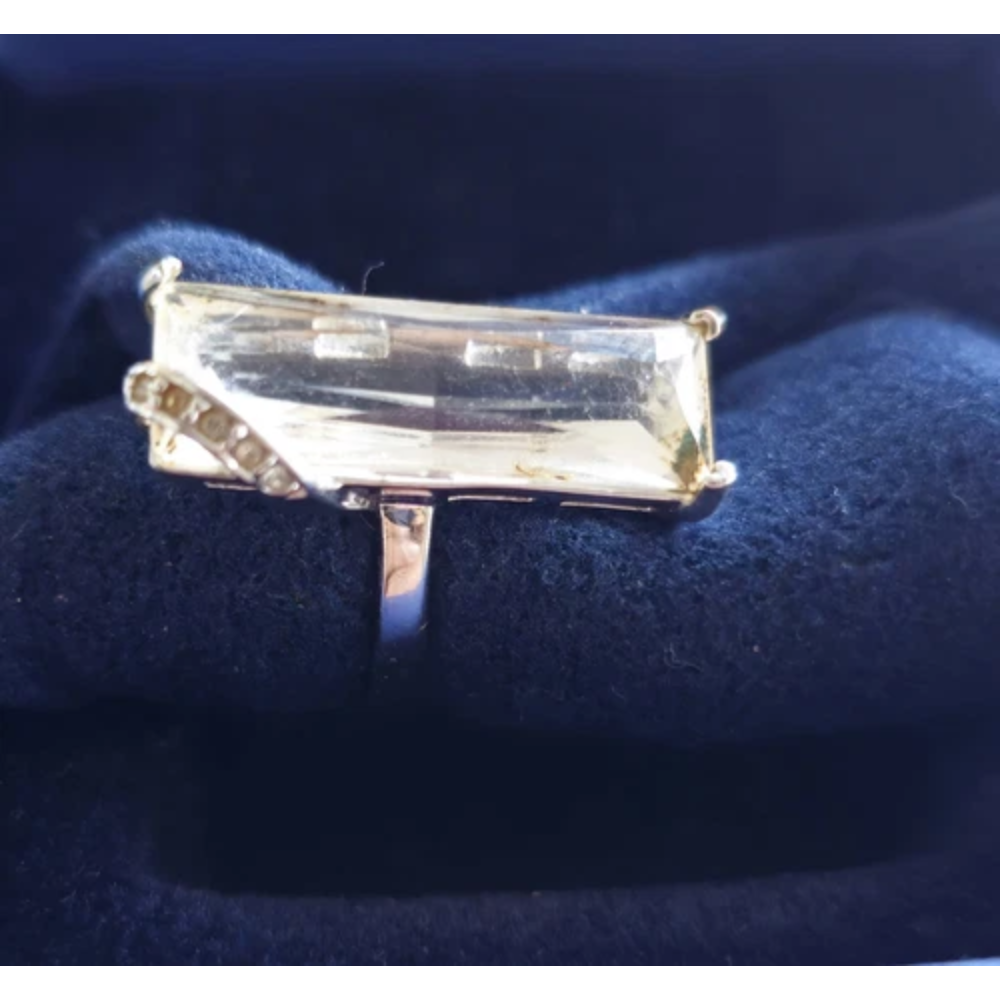 Silver ring with a large rectangular gemstone