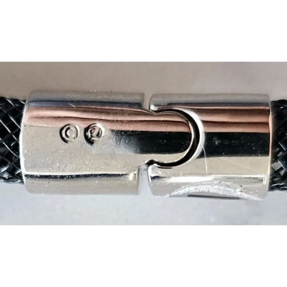 Close-up of a metallic lock mechanism on a white background