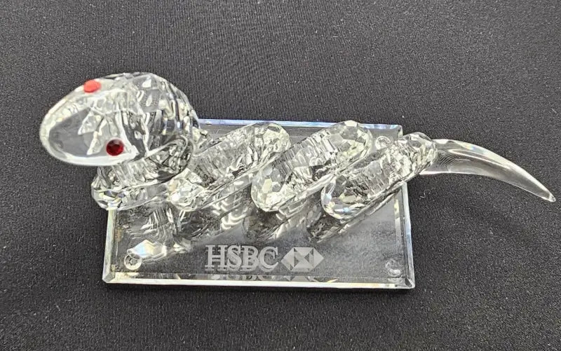 Crystal mouse figurine on a stand with HSBC logo