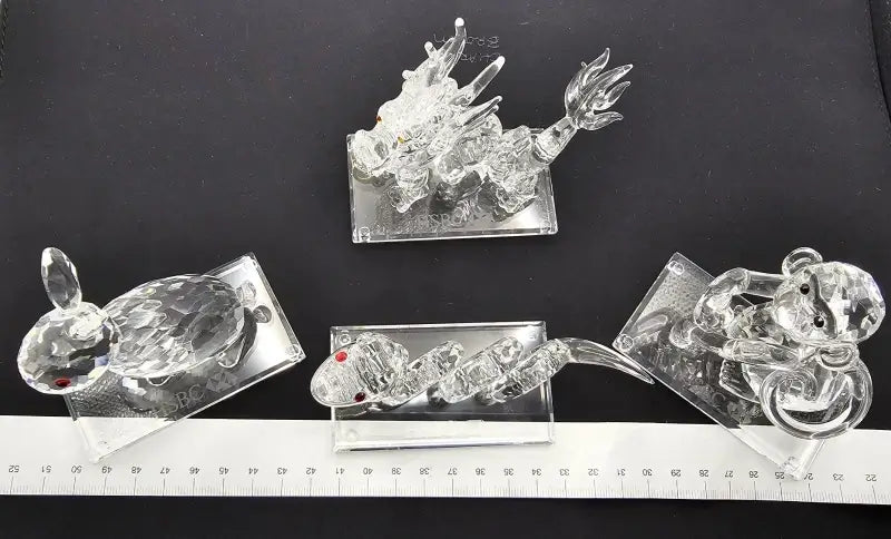 Clear rabbit-shaped objects on a black