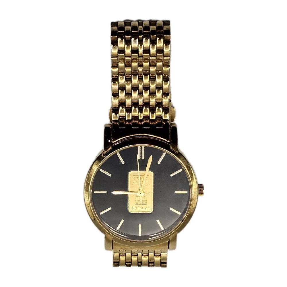 Gold watch with black face on a white background