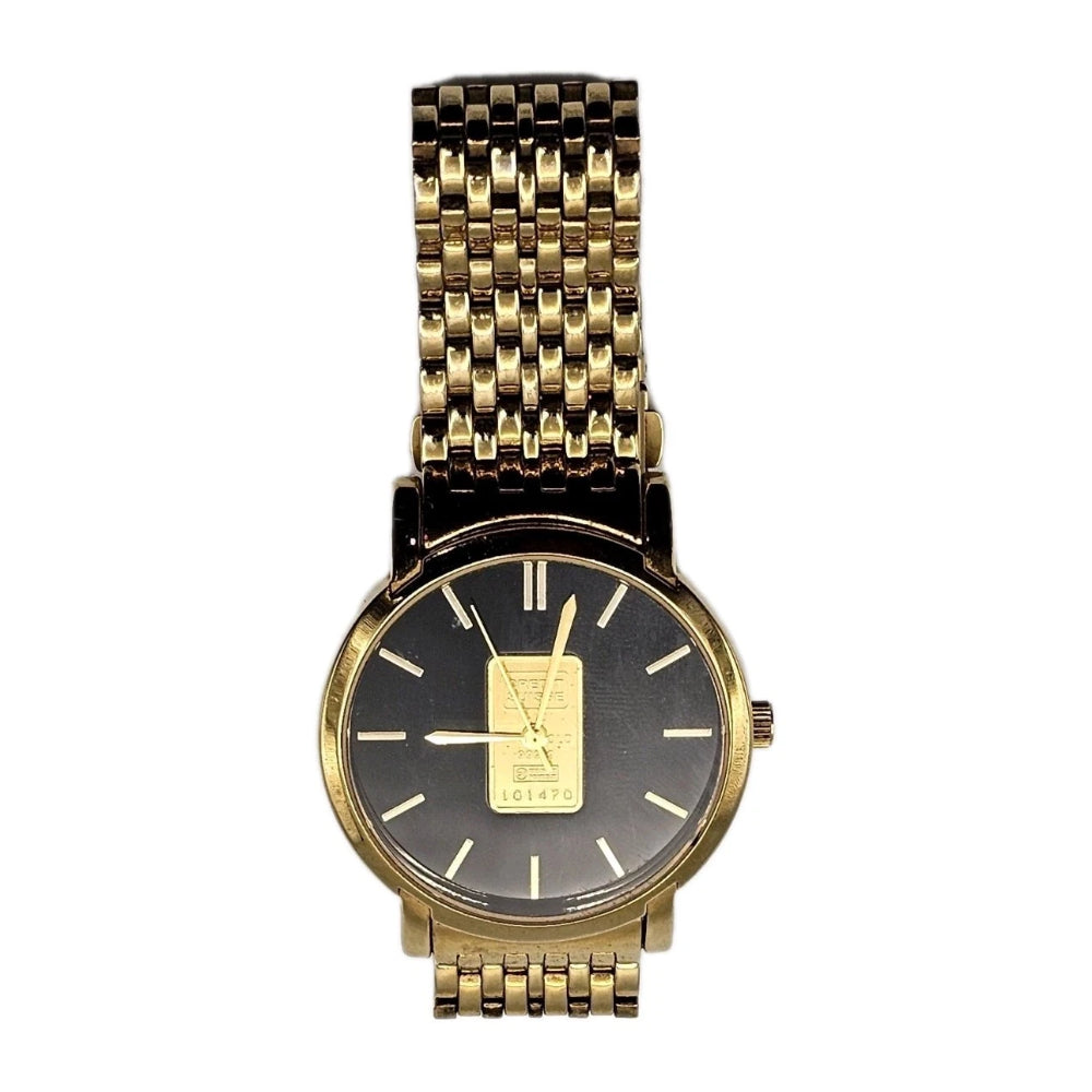 Gold watch with black face on a white background