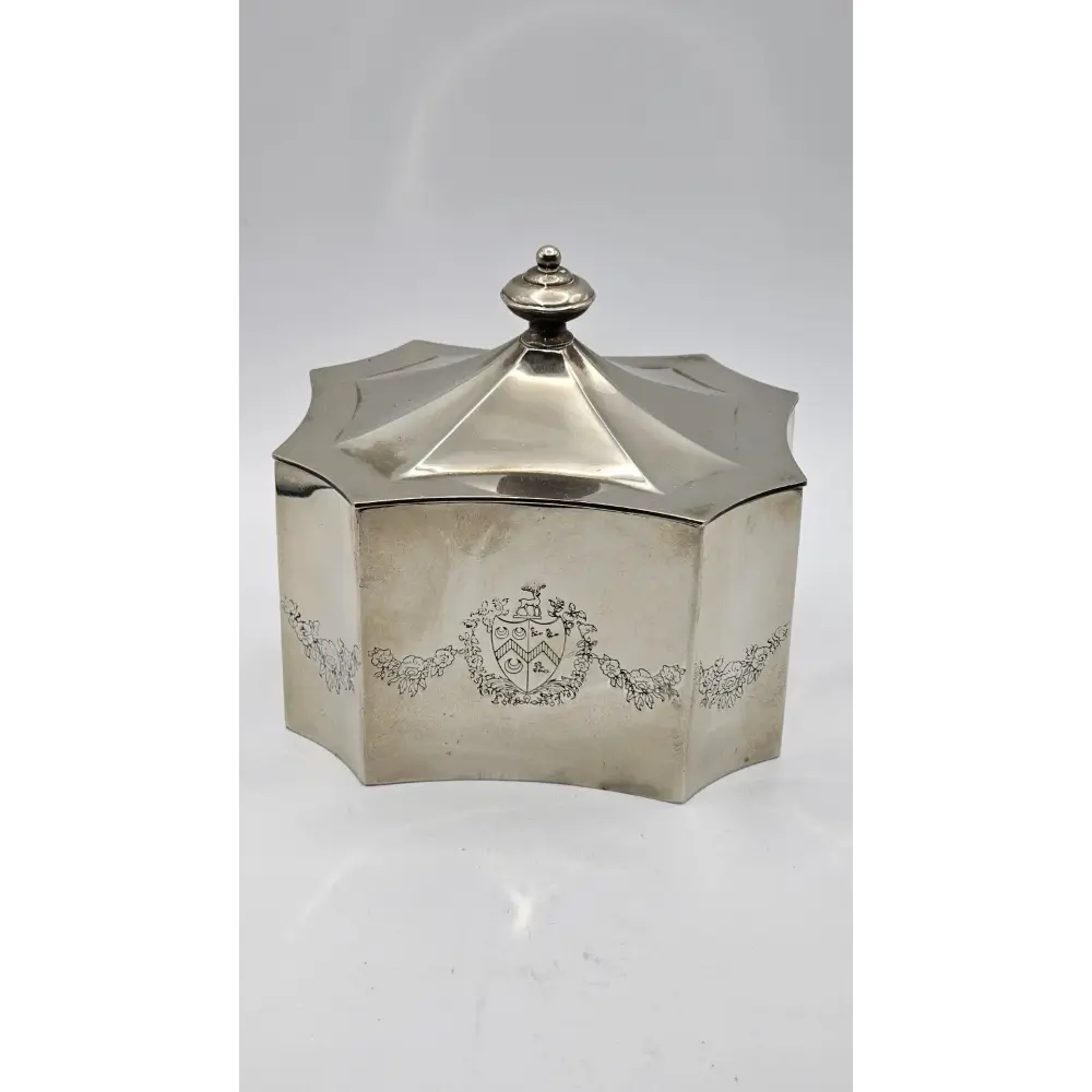 Silver hexagonal box with intricate designs