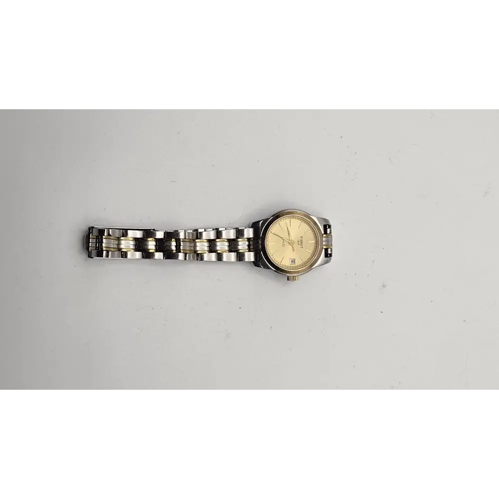 Wristwatch with a metal band on a light gray background