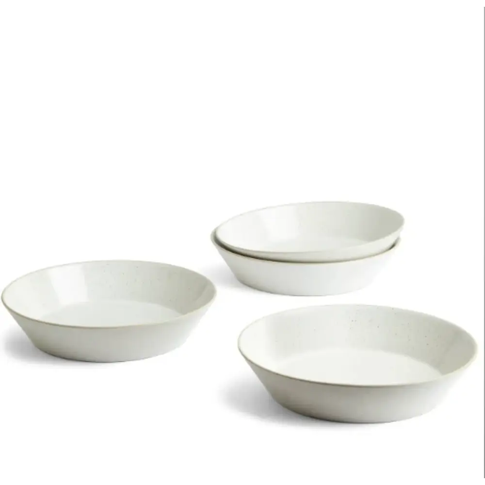 Four white ceramic bowls