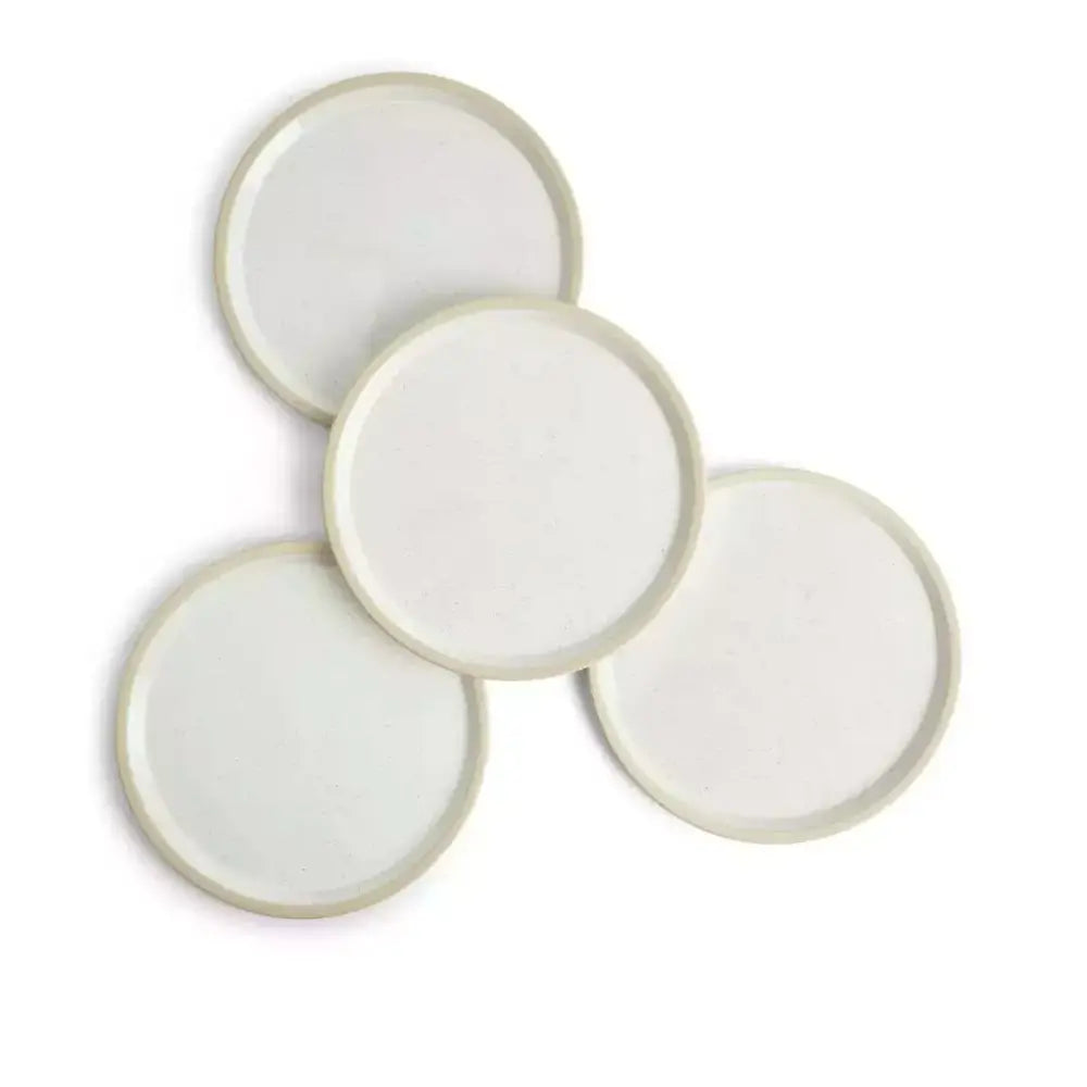 Four round ceramic plates