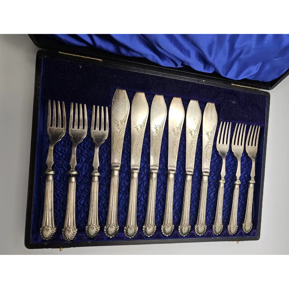 Victorian era silver fish knife and fork set decorative cutlery