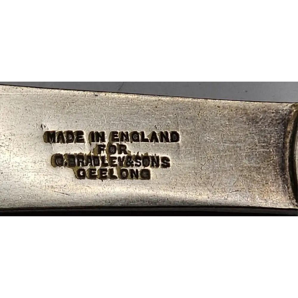 Metal object with 'Made in England for G. Hable & Sons Geelong' engraving