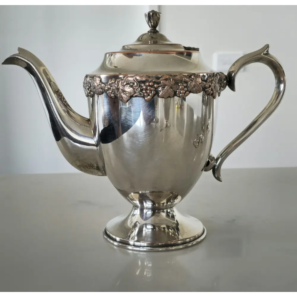 Decorative vintage silver plated tea set perfect for display or entertaining