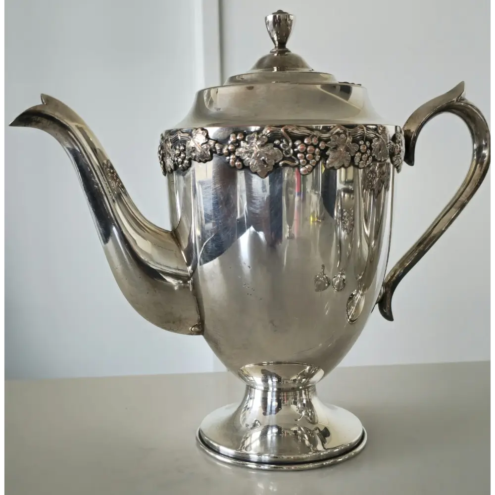 Decorative vintage silver plated tea set perfect for display or entertaining