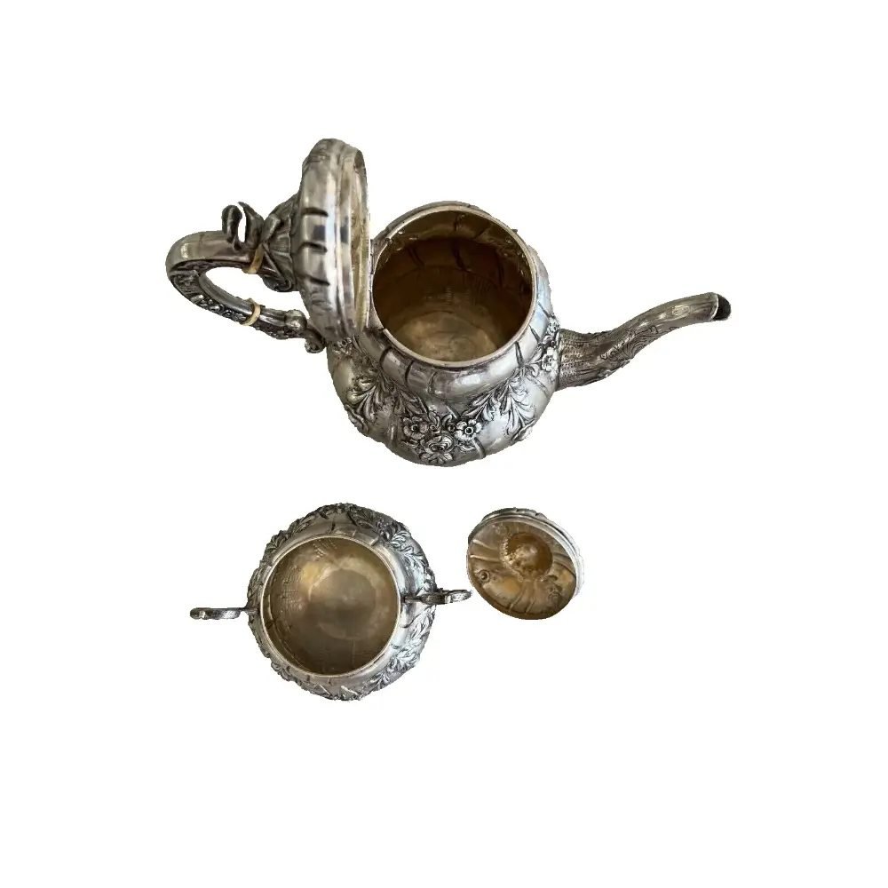 Decorative vintage German silver tea pot and sugar bowl for display with lid