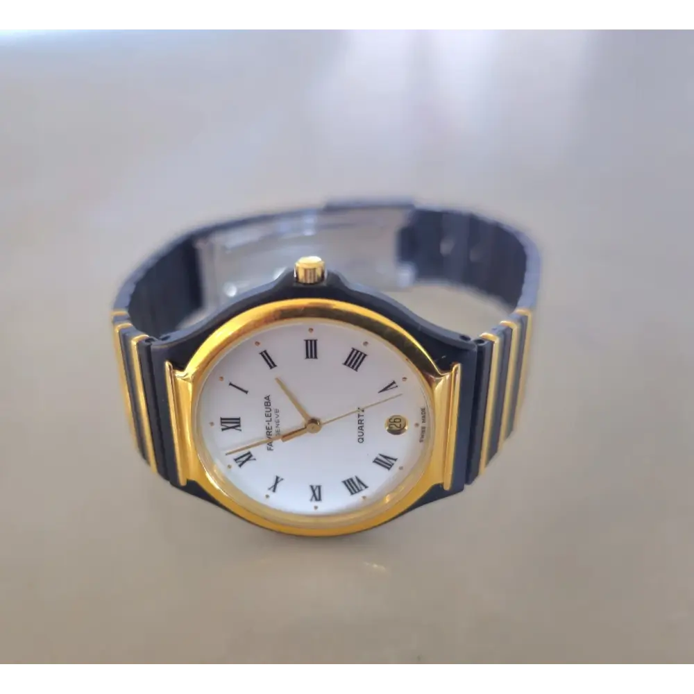 Wristwatch with gold and black strap