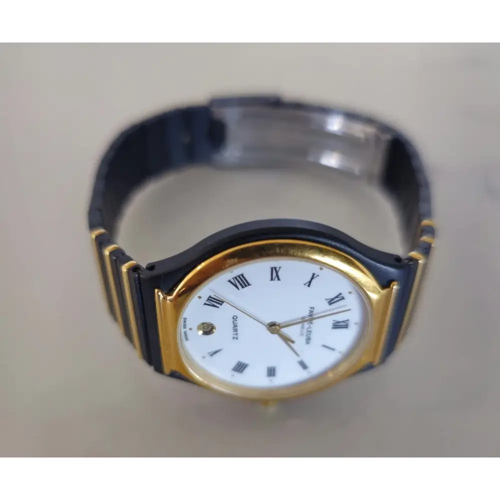 Wristwatch with gold and black band