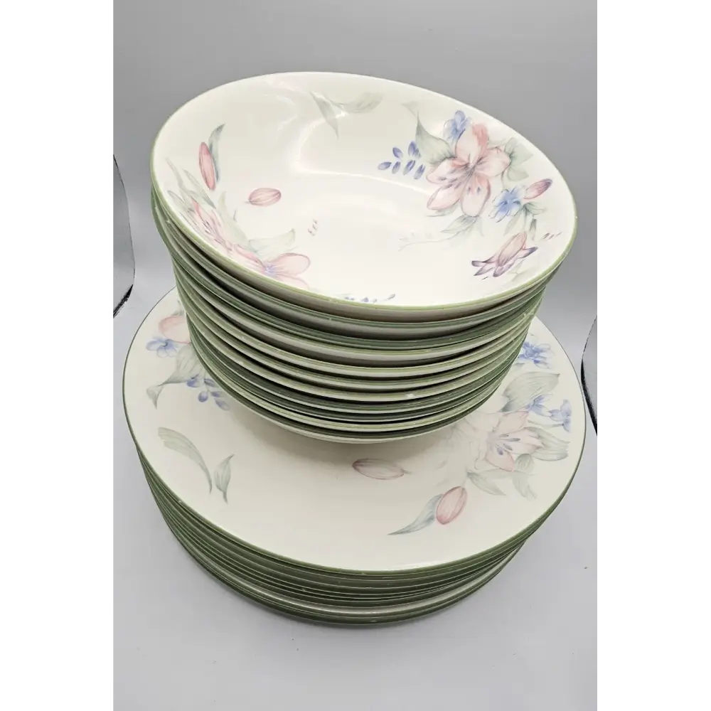 Stack of ceramic plates with floral patterns