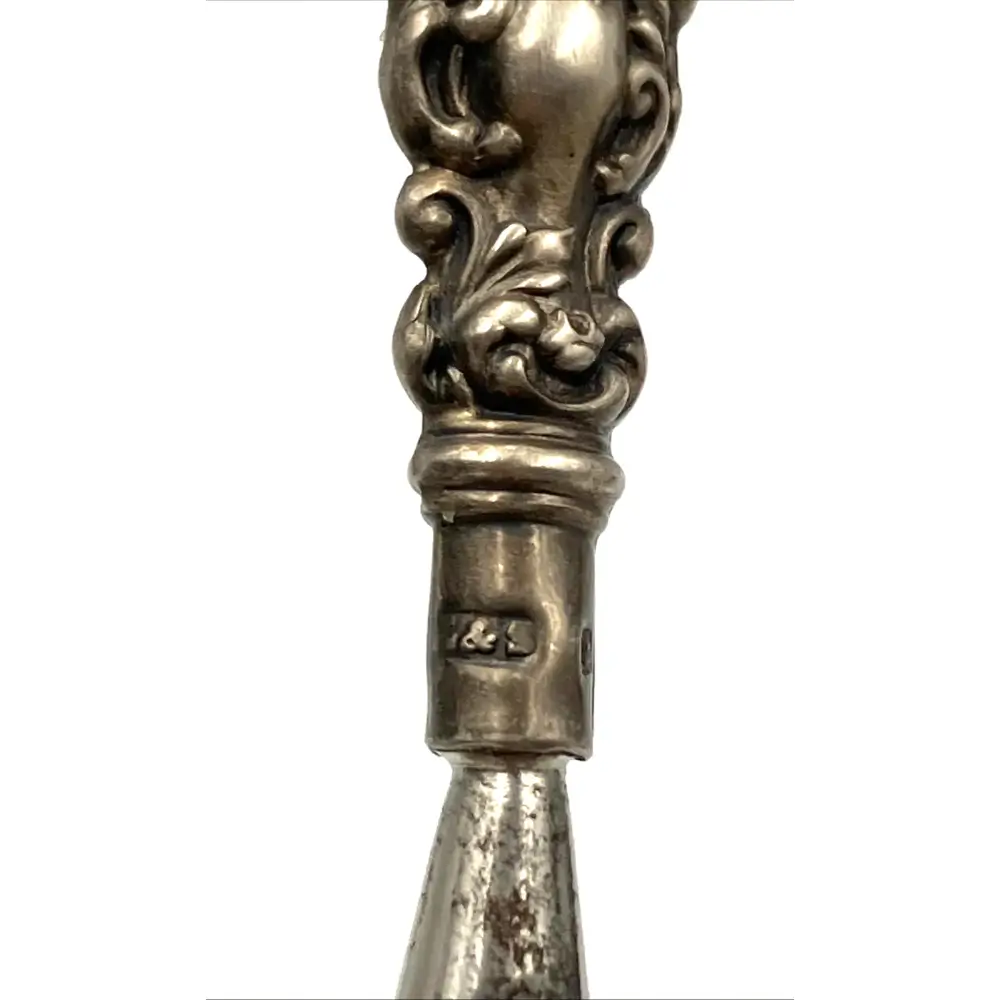 Decorative silver spoon handle