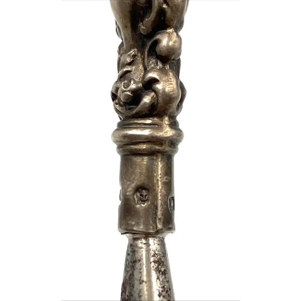 Decorative silver object with intricate design