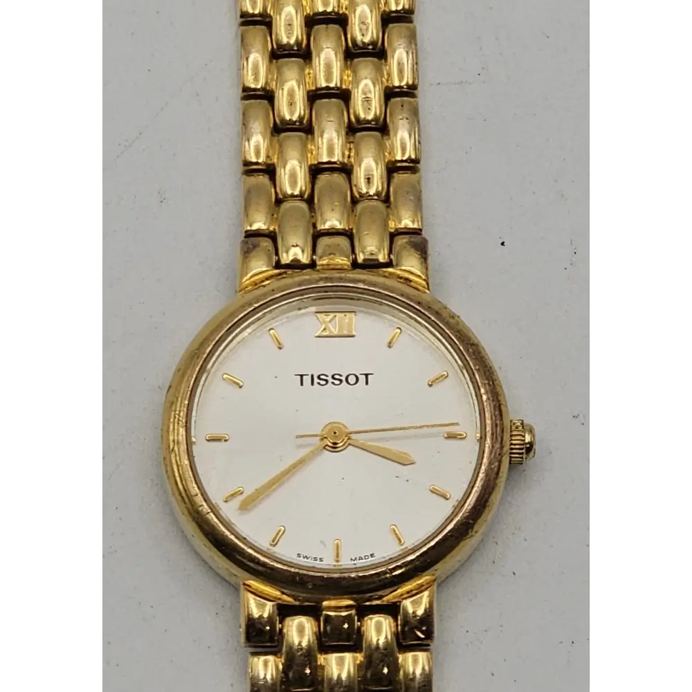 Gold Tissot watch