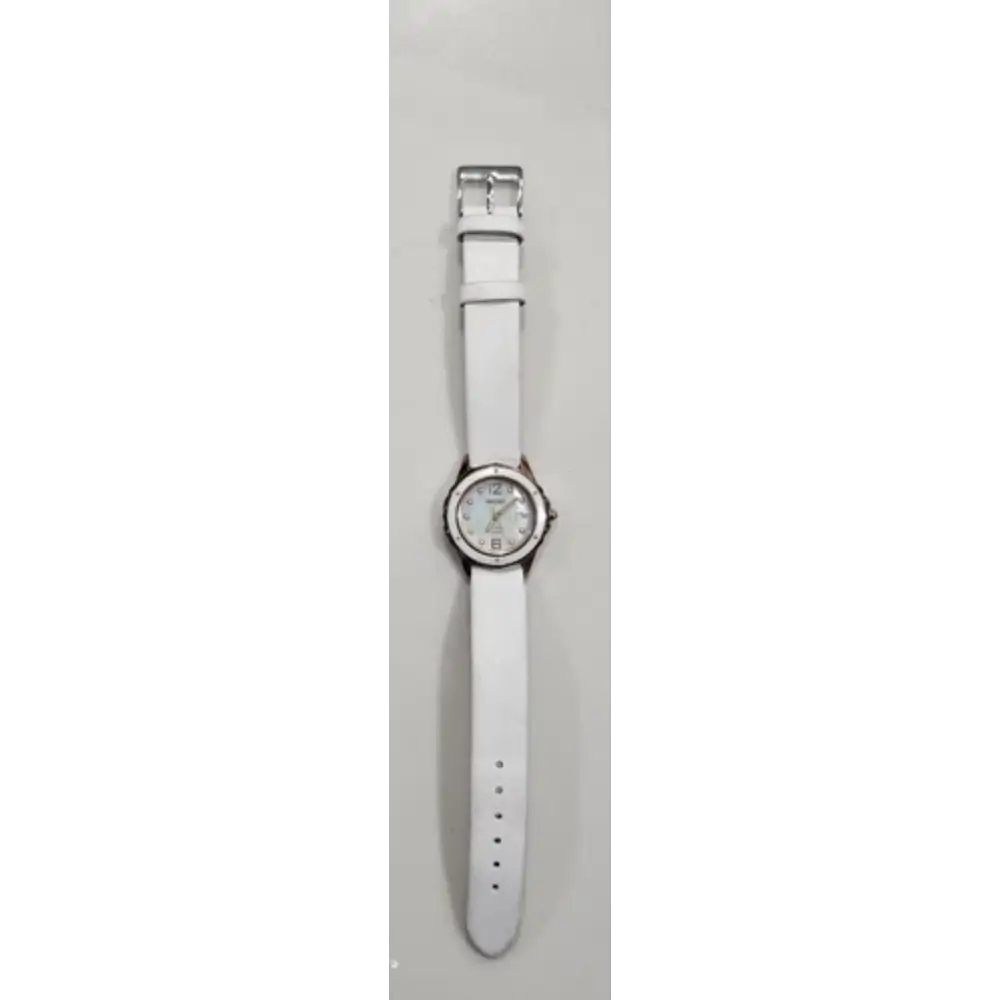 White wristwatch with a silver case on a white background
