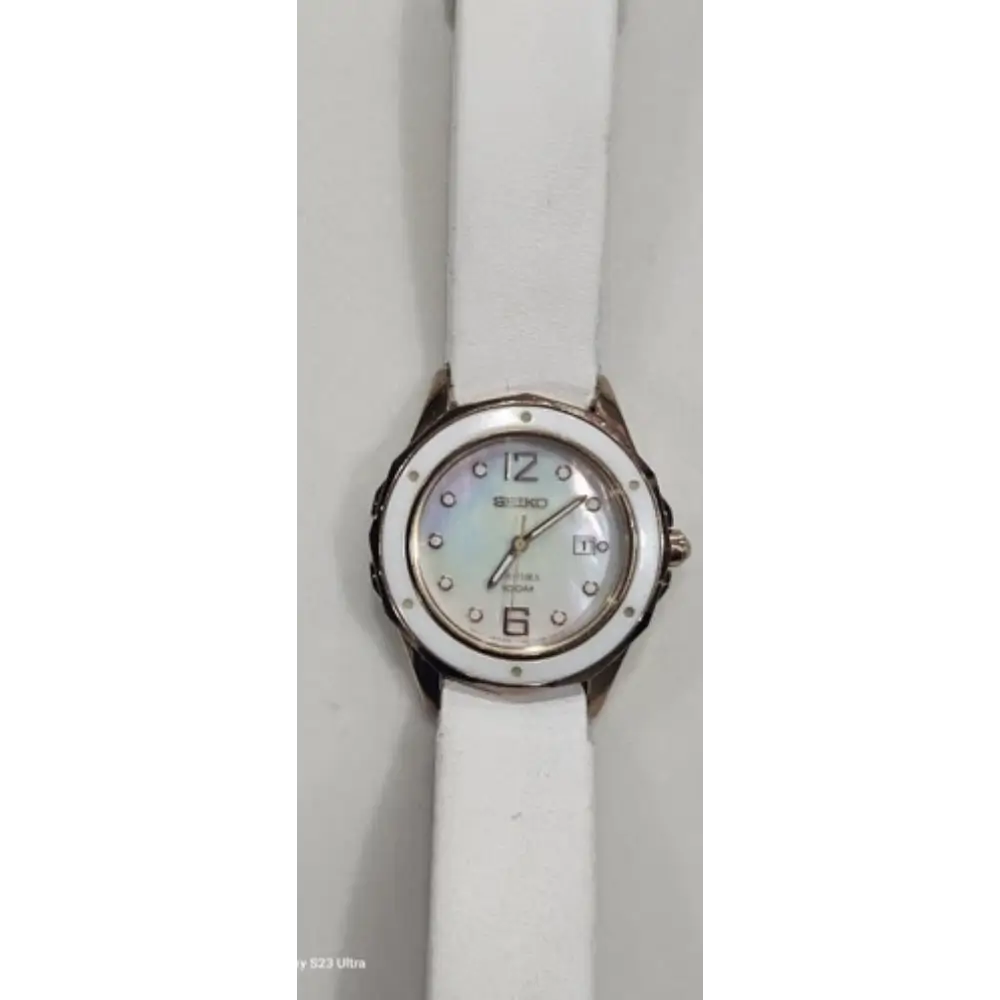 White wristwatch with a silver case