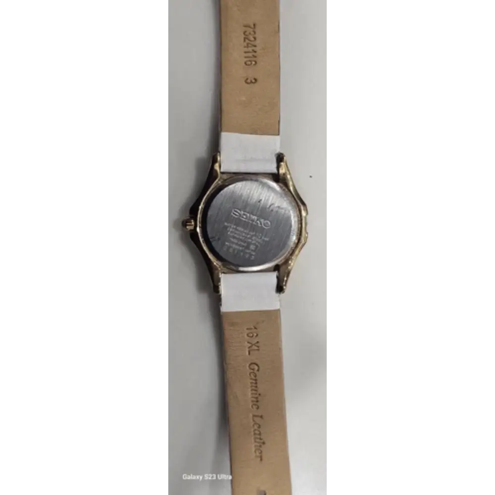 Watch with a brown leather strap