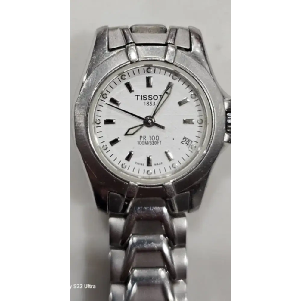 Silver Tissot watch with a white face