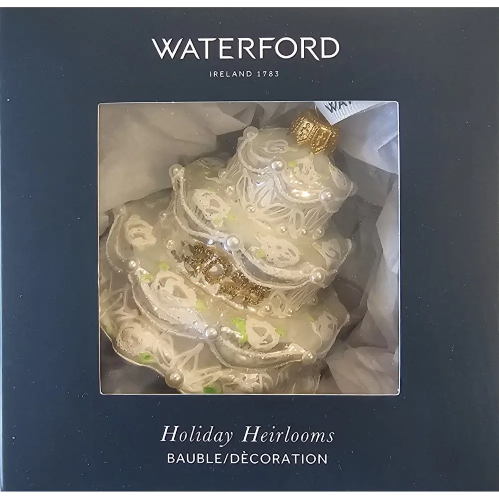 Decorative ornament in a Waterford box with 'Holiday Heirlooms' text.