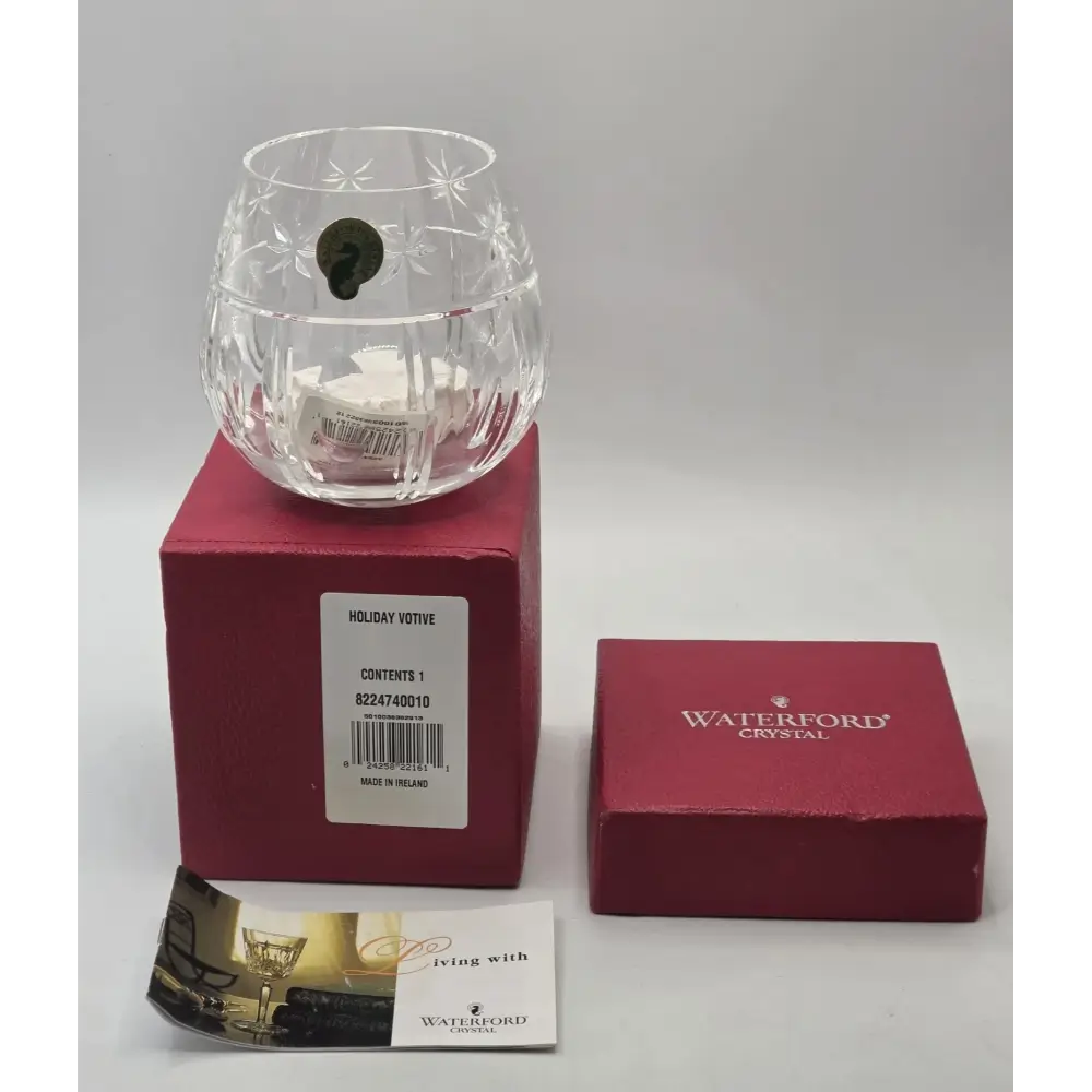 Crystal holiday votive candle on a Waterford Crystal box with a gray background