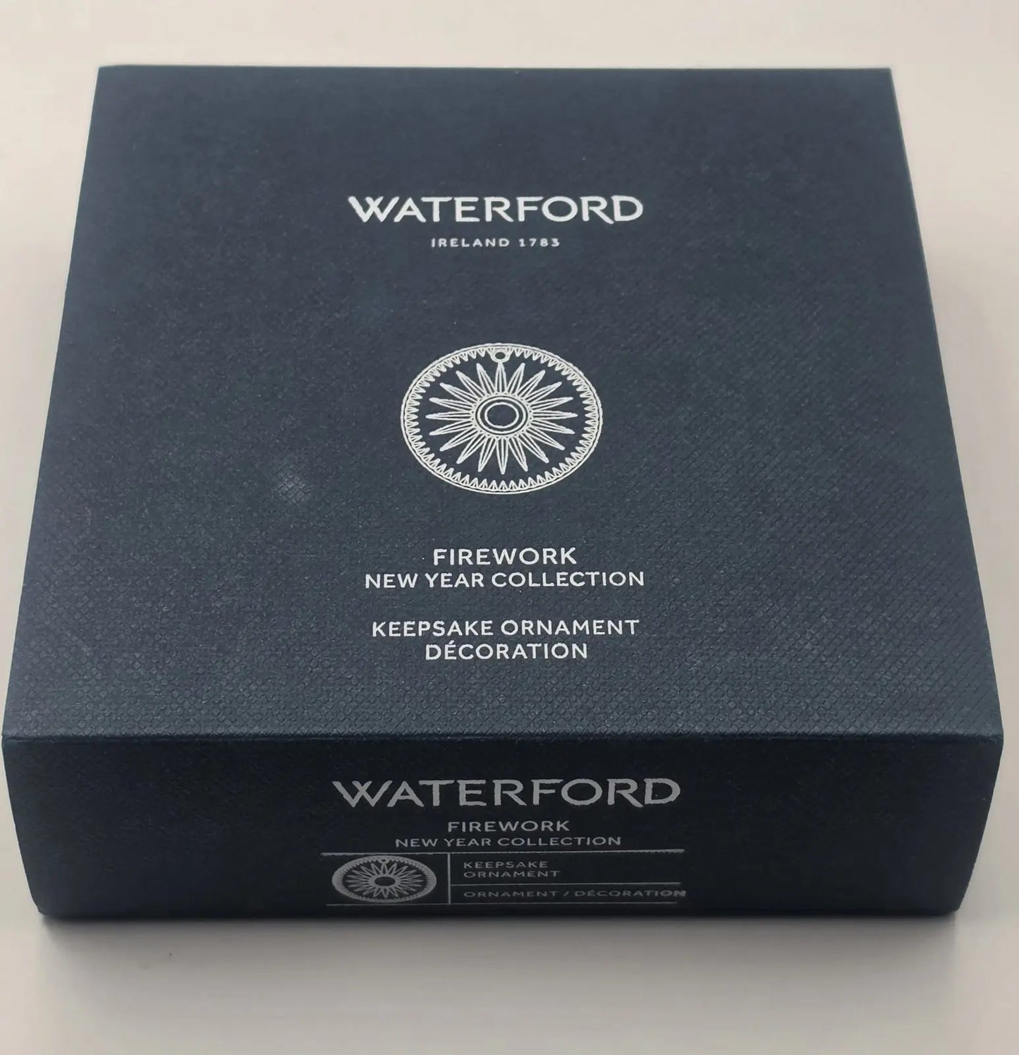 Blue box with Waterford branding and text about a New Year collection on a white background
