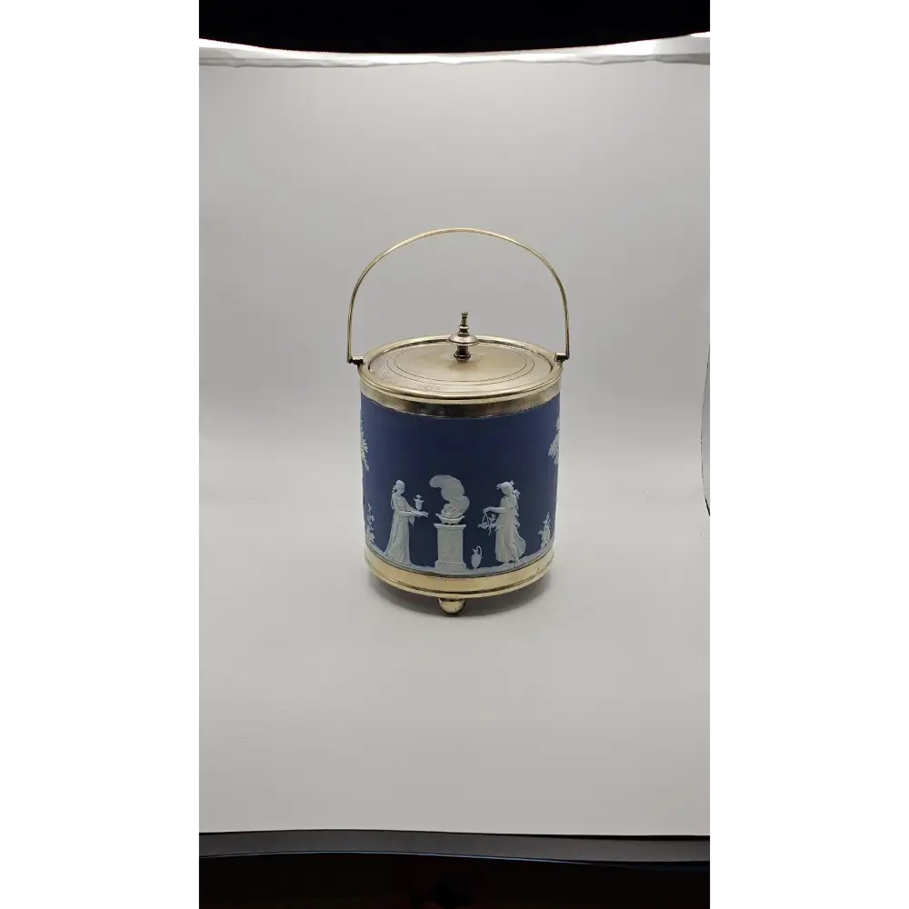 Decorative blue container with white figures