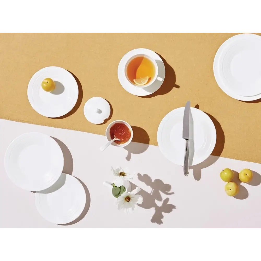 Table setting with white plates