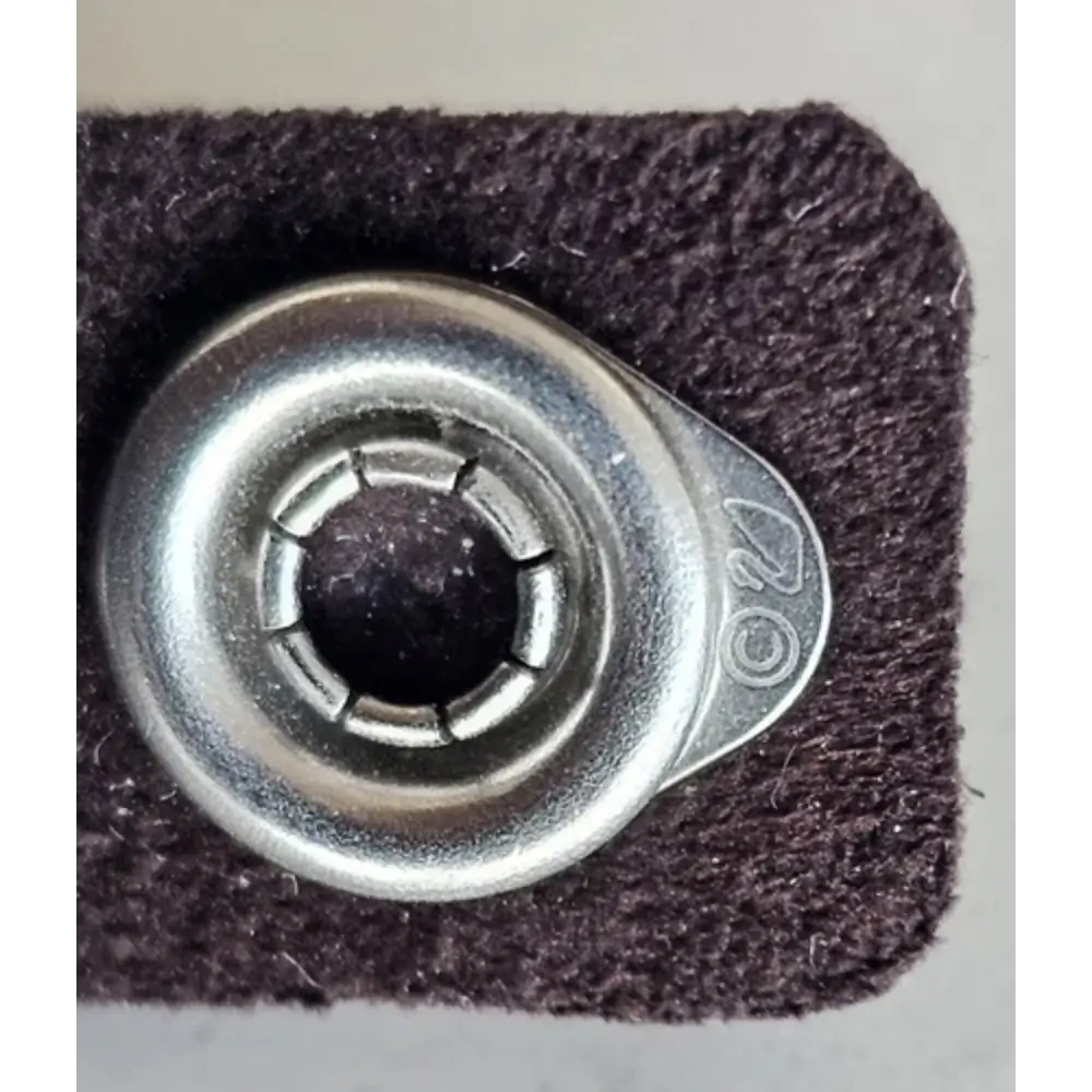 Metallic bearing on a brown square