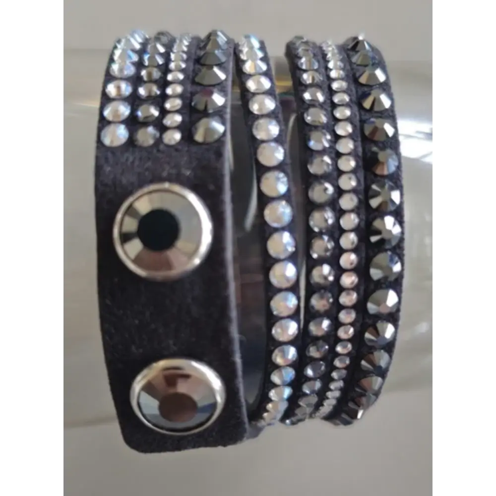 Black leather wrap bracelet with silver studs and buttons