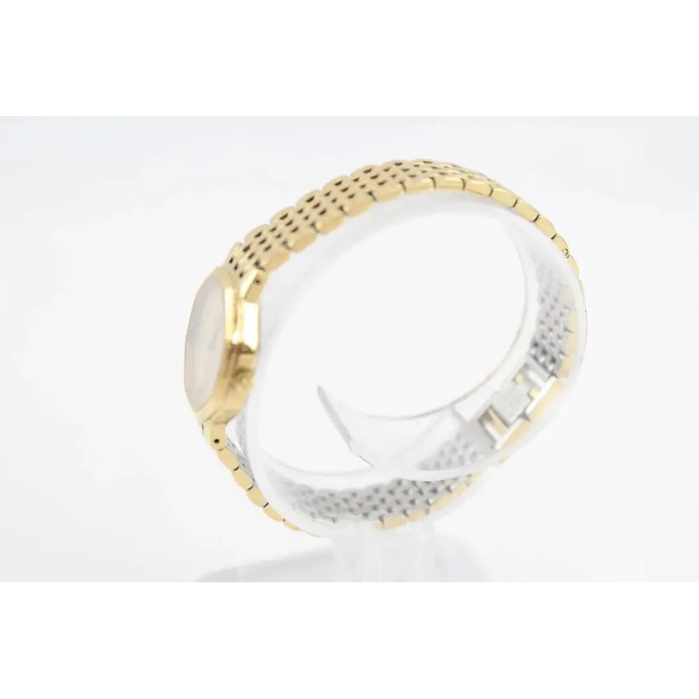 Gold and silver ring on a white background