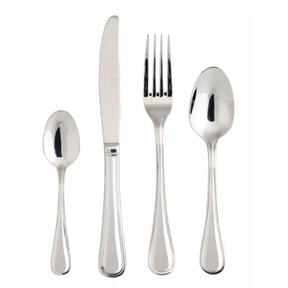 Set of silver cutlery including a knife, fork, and two spoons